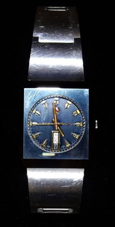 RADO AUTOMATIC MAN'S WRISTWATCH: DiaStar, day-date, square stainless steel case with matching Rado bracelet, 31mm