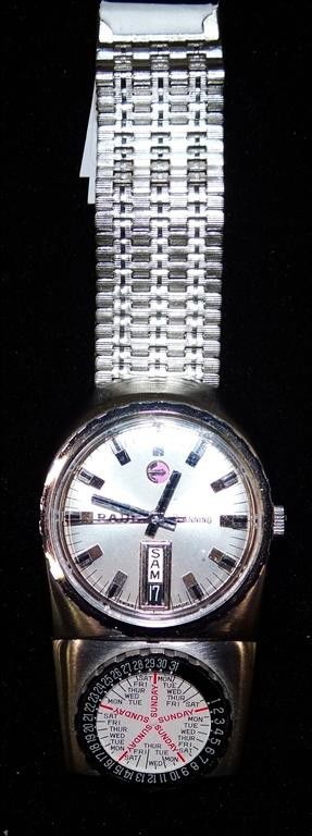 RADO AUTOMATIC MAN'S WRISTWATCH: Planning day-date model, separate case section carrying perpetual calendar dial, brushed steel case and bracelet, 31mm