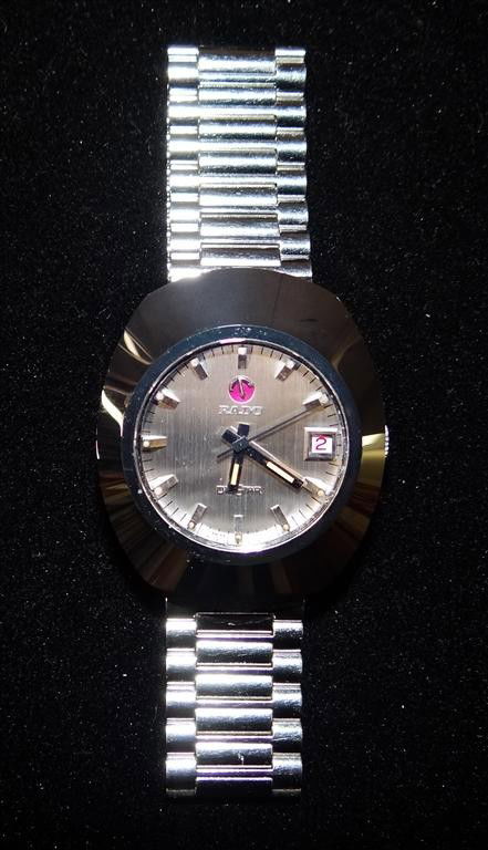 RADO AUTOMATIC MAN'S WRISTWATCH: DiaStar, day-date, ovoid stainless steel case with matching Rado bracelet, 33mm