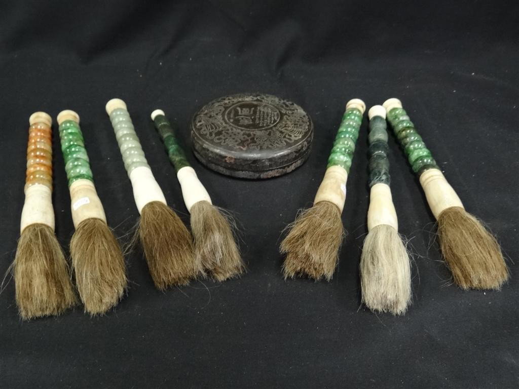 LOT OF EIGHT(8) ORIENTAL ITEMS: Lot including: seven(7) calligraphy brushes with hardstone handles, together with a cannister of ink; 12in. (brushes)