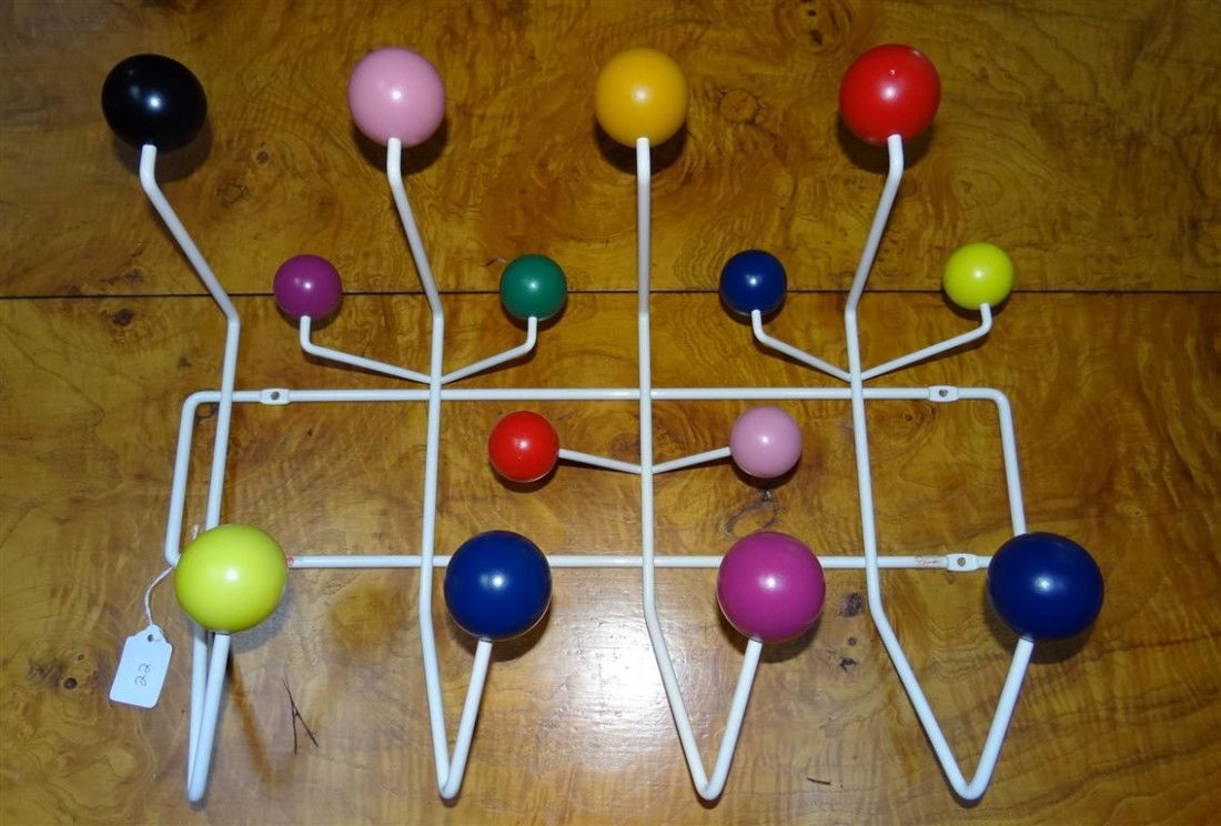 WALL MOUNTED COAT RACK BY HERMAN MILLER: Herman Miller Eames Hang-It-All Rack. Approx. 20" wide