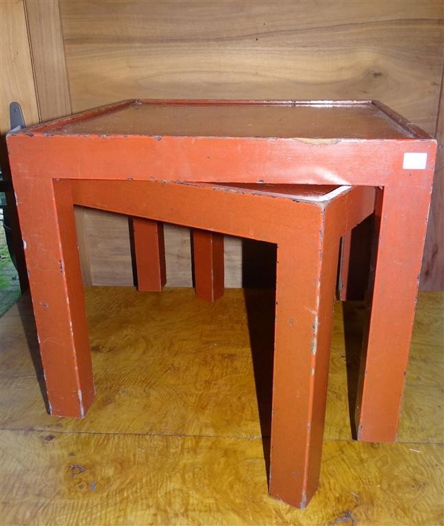 RED LACQUERED PARSONS TABLES: Two red lacquered parsons tables. Some chipping and lacquer loss. 15" high x 18" square.