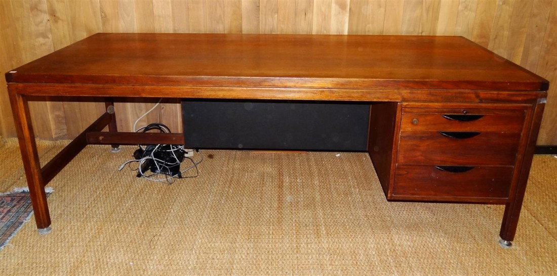 LARGE, HIGHLY IMPORTANT DESK BY JENS RISOM: Water stain in upper left of top.; 29.25in. H. x 81in. W. x 36in. D.