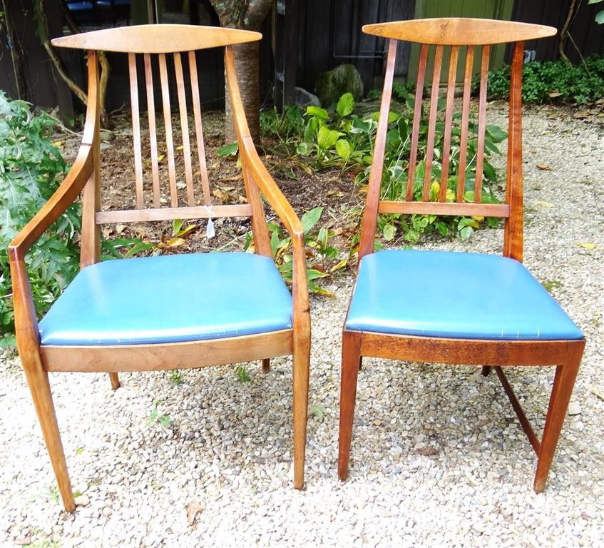SET OF 6 PAUL McCOBB DINING ROOM CHAIRS - CALVIN L: Two armchairs and four side chairs from the Calvin line. Original blue leather seats with manufacturer tags beneath four of the chairs (2 arm & 2 side). One of the side chairs is needs a slat replaced