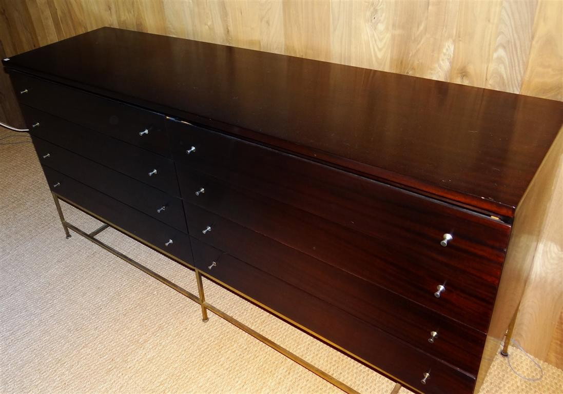 PAUL McCOBB "CALVIN" LINE 8 DRAWER SIDEBOARD: Dimensions 71"W. 34 1/2" H 19"D Purchased from Lost City Arts.