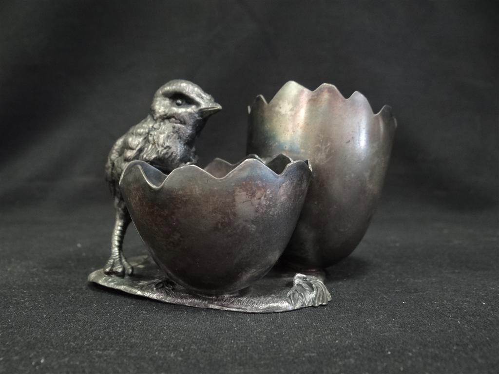 JAMES W. TUFTS TOOTHPICK HOLDER: Two large half egg holders next to a large chick. James W. Tufts 3402