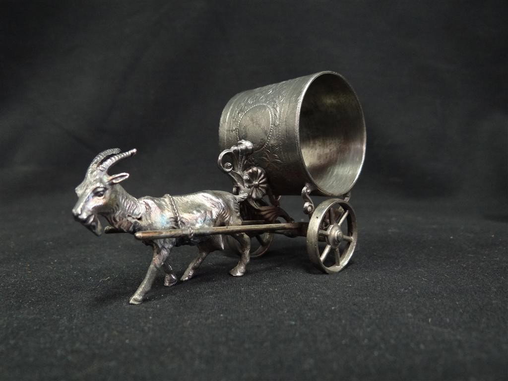 FIGURAL NAPKIN RING GOAT ON WHEELS: Vintage American Victorian figural napkin ring on a wheeled cart, pulled by a goat