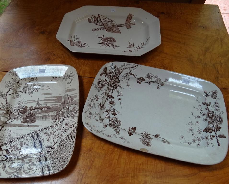 ENGLISH IRONSTONE TRANSFERWARE PLATTERS: Three English ironstone platters. Brown transferware patterns. Various marks. 14-1/2" to 16" wide
