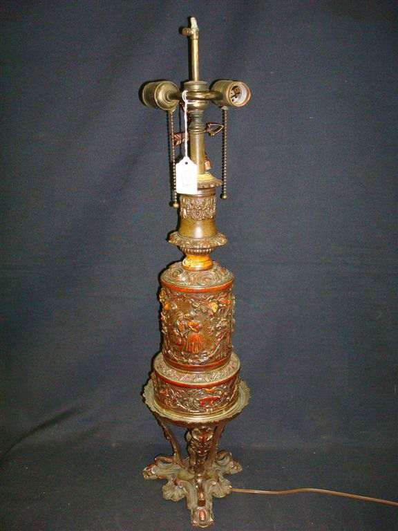 FREDERICK COOPER LAMP BASE SGD.: Frederick Cooper lamp base , Chicago. Polychromed scenes of dancers and musicians. Marked at base 260 and with a paper label for Frederick Cooper. 28"H.
