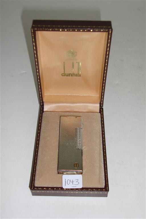 DUNHILL CIGARETTE LIGHTER: Original box. Original bag. Never been opened. Original price tag $185 intact.