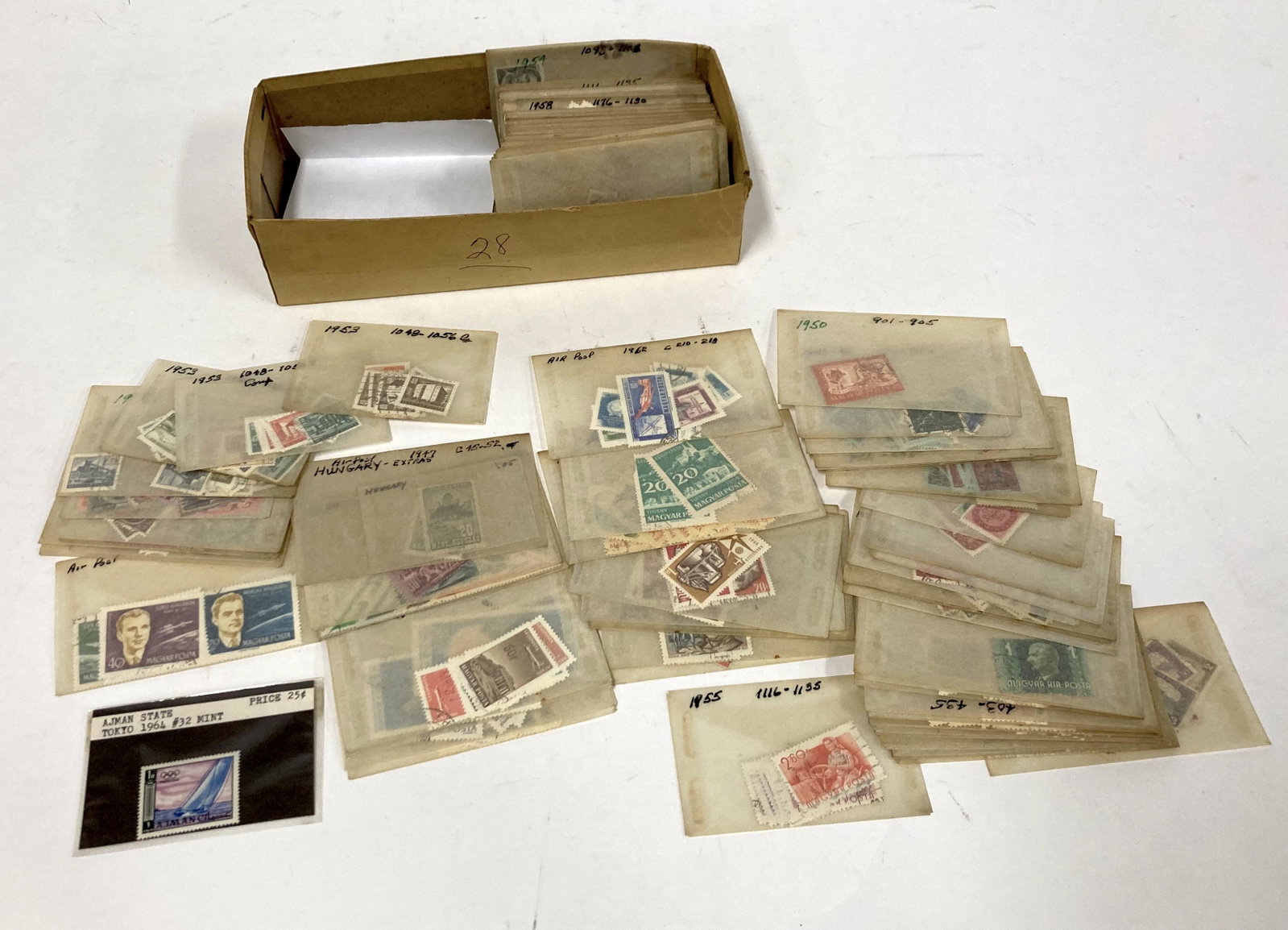 Box of Unsearched Hungarian Stamps: Mint and Used in the lot. As early as 1897. Teens, 30's 40's, 50's and 60's in the lot.