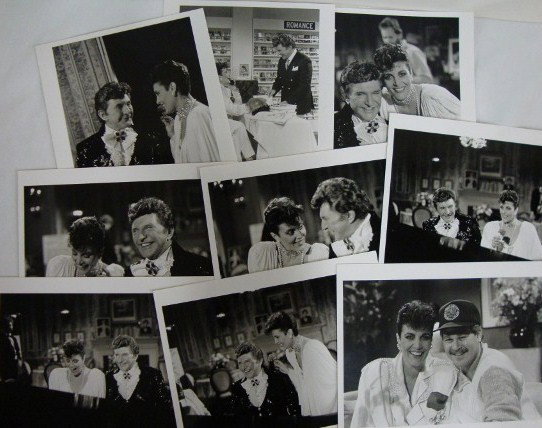 "ANOTHER WORLD" PHOTOS LIBERACE & LARAINE DAY (9): Nine black & white glossy photos of Liberace with Laraine Day in original envelope from Solters/Roskin/Friedman, Inc. New York, NY 8 x 10