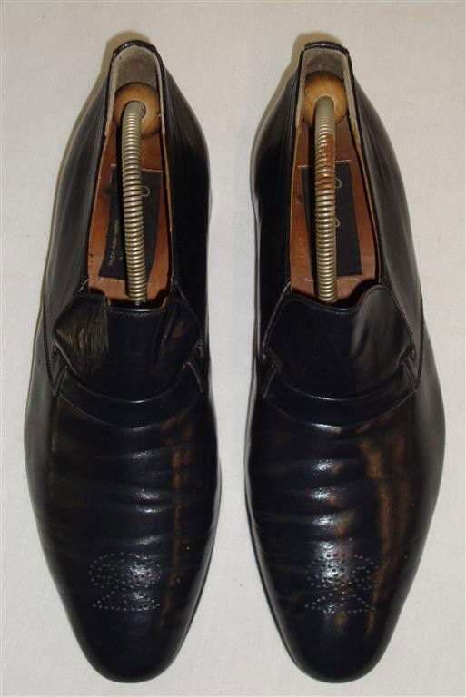 LIBERACE'S PIERRE CARDIN LOAFERS: With Pierre Cardin New York Paris labels. Perforated leather designs at toe front size 10M