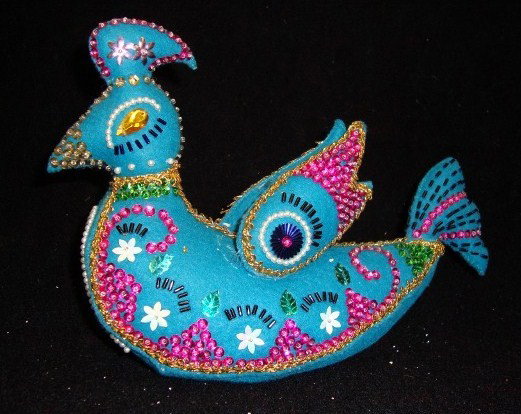 LIBERACE CHRISTMAS ORNAMENTS (5): Sequined decorated bird, handmade by Liberace; paper & wax covered balls; hand blown ornaments.