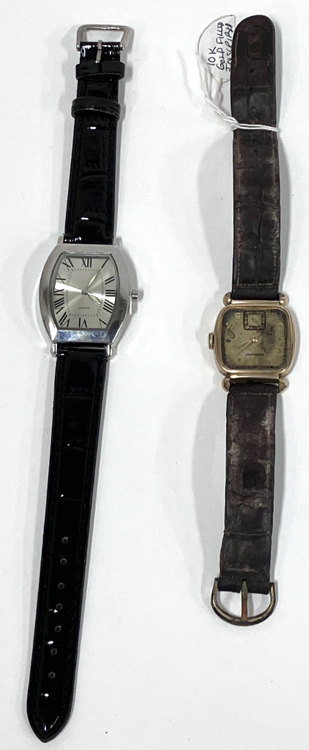 10 K GF 1942 Watch & a 2nd: 10K GF 1942 watch marked at the back 3-5-42 and 10K GF. Inscribed at back with name. Included in the lot is a second watch, Stainless steel case., quartz movement. marked SKC. two in the lot. 10K gold