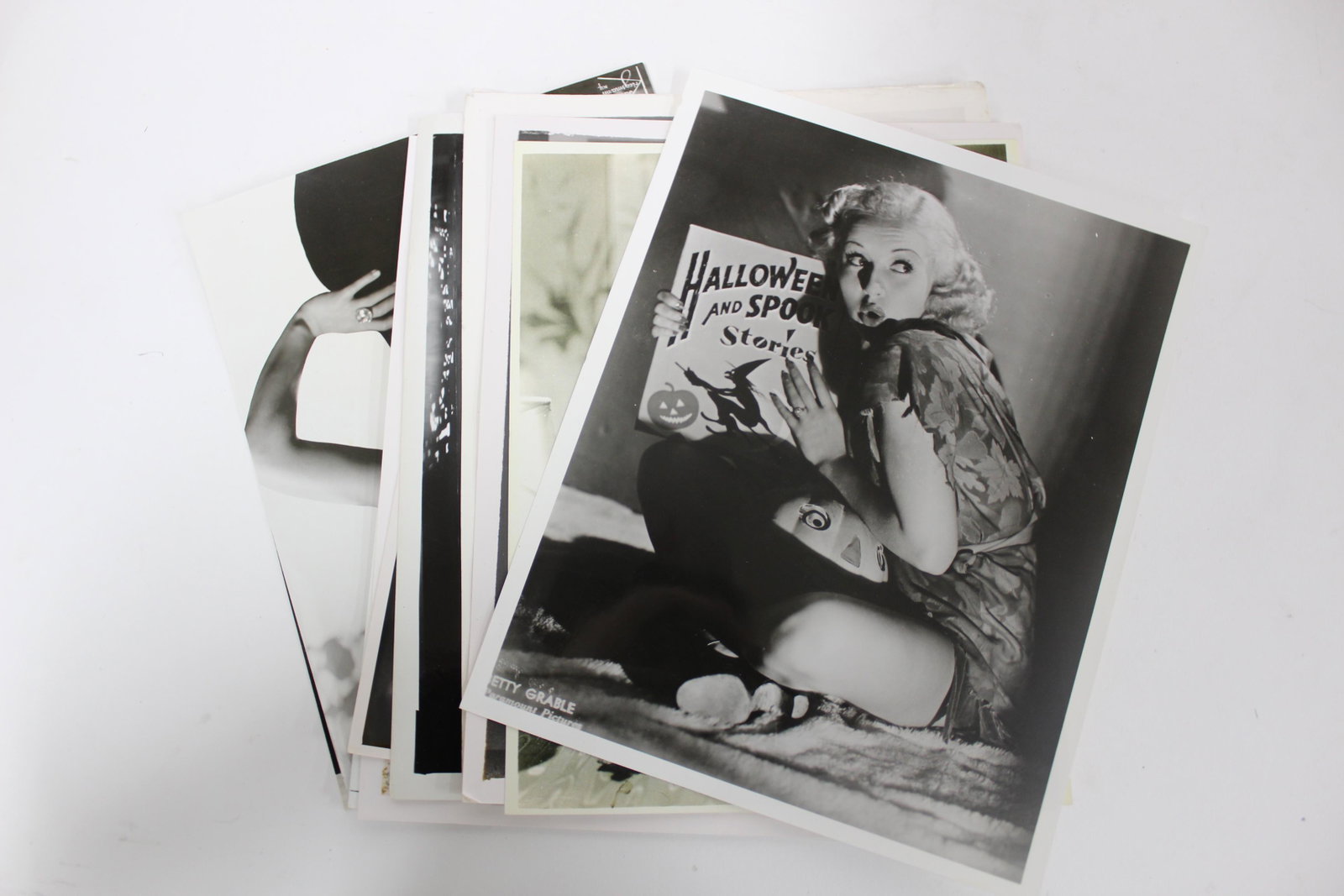 Hollywood Glamour Queens Photographs (10): Jean Harlow (2); Betty Grable (Andrewski Coll. backstamp); Myrna Loy (backstamp for Douglas Whitney Coll.)Marlene Dietrich; Lana Turner; Ginger Rogers; Eartha Kitt, publicity snipe at back for Mrs. Pa
