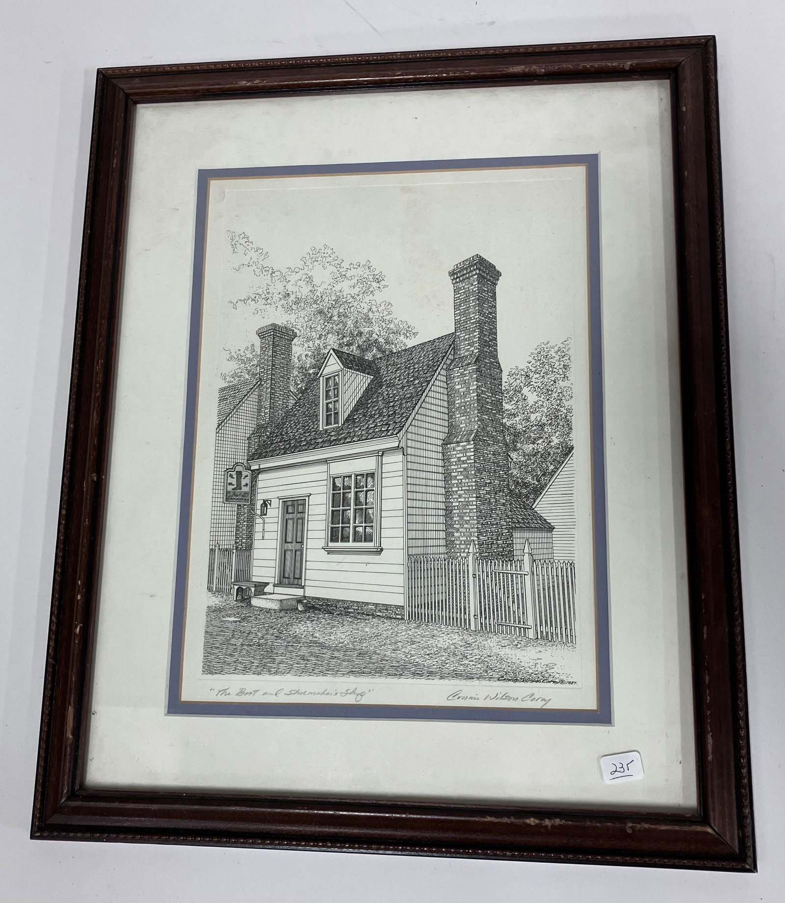 Connie Wilson Corey Engraving Sgd.: The Boot and Shoemaker's Shop. Signed in the plate and sgd. in the margin. Gallery double matted and framed. 11 1/2" x 8 1/2" (work) Overall size. 17" x 14"