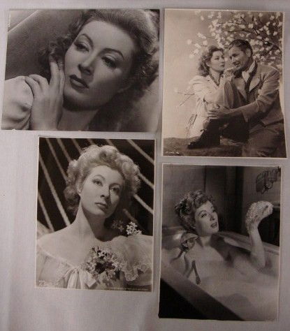 GREER GARSON PHOTOGRAPHS & STILLS (29): Clarence Sinclair Bull portrait with a back stamp; 1945 scene from Mrs. Parkington with date stamp and cast listin; c/u cardboard stock publcity portrait for same with publicity snipe; stills from Blo