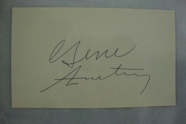 GENE AUTREY ROY ROGERS D. EVANS AUTOGRAPHS: Gene Autrey autogaph. Signed in blue ink Gene Autrey on an index card. Roy Rogers and Dale Evans autograph on the same piece of paper.
