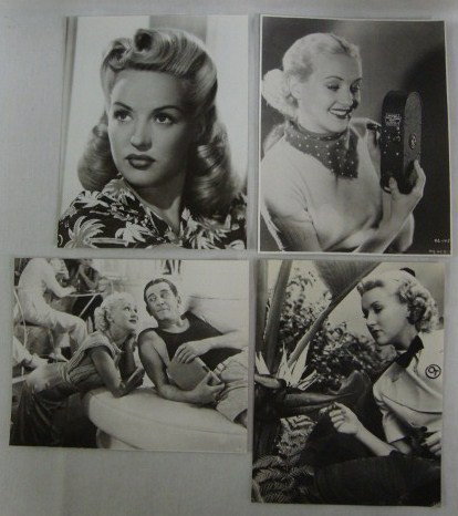 BETTY GRABLE STILLS AND PORTRAITS (82): An album of Betty Grable movie stills and portraits to include seven close up portraits; 24 glamour publicity photos; 32 scenes for movies; 4 candids and one of the actress as a child. Movies represen