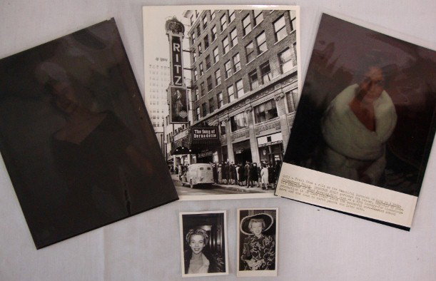 JENNIFER JONES LSOT: A press photo of the lines at the Ritz to get into the theatre to see The Song of Bernadette; two candids inc. one with a back stamp for Theodore Carstens and two colored negatives, one a publicity ph