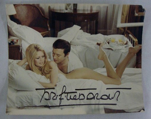 SIGNED BRIGITTE BARDOT PHOTOGRAPH: With a back stamp for The Collection of Tony Williams. Signed Brigitte Bardot in bold black ink. Right upper corner off. Slight abrasion L. Ro. Both will be visible in the photo. 9 1/2" x 11 1/2"