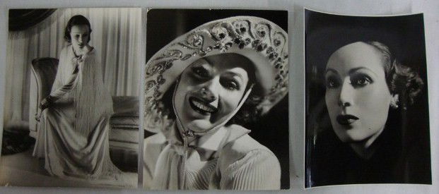 DOLORES DEL RIO PORTRAITS BY ELMER FRYER (3): For Warner Bros F. N. Studios with back stamp for the photographer; cardboard stock 1934 full length portrait with back stamps for Fryer, date and Photoplay; 1935 cardboard stock c/u portrait with all