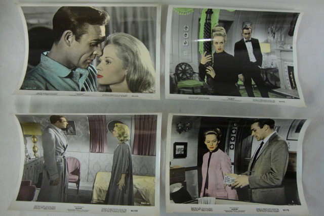 HITCHCOCK AND JAMES BOND MOVIE STILLS (69): Movie stills. Early 1960's. Marnie, 1964 (37-7 are hand colored). From Russia With Love, 1964 (17) and Dr. No, 1962 (15). All three movies star Sean Connery.