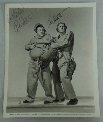 SIGNED ABBOTT AND COSTELLO PHOTOGRAPH: 1941 Universal Pictures publicity photograph for Keep Em Flying signed in purple ink Best Wishes, Bud Abbott and in black ink Lou Costello Good
