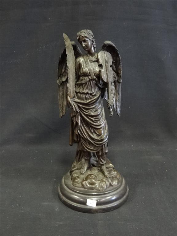 BRONZE ARCHANGEL FIGURE WITH VIOLIN: Well detailed figure with violin and large feather "bow". 12 1/2"H. 5 1/2"W