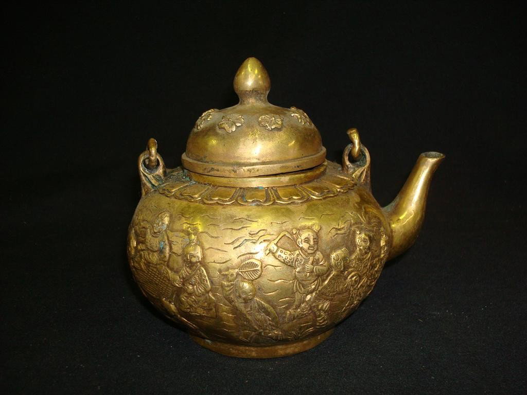 ORIENTAL DORE BRONZE TEAPOT: Dore bronze teapot with high relief figural decoration; 5in. H.