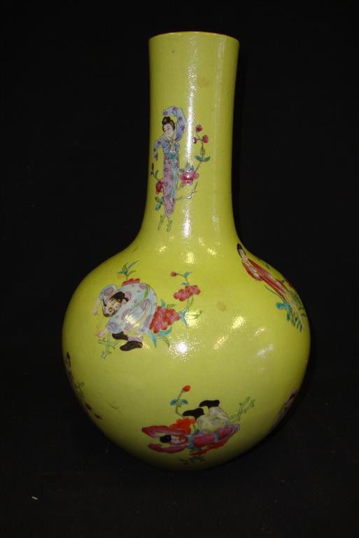 19th C. BOTTLE NECK VASE PAINTED IN FAMILLE ROSE: Yellow glaze with figures. Qing Long mark. 14-3/4” high