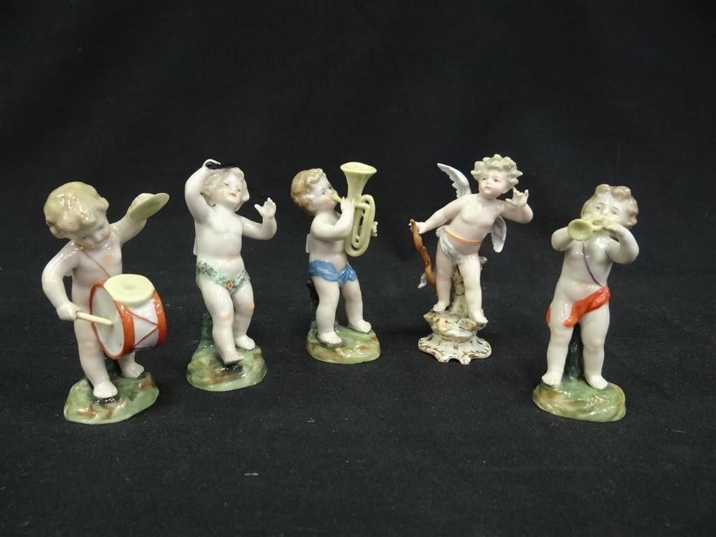 FIVE ENGLISH AND MEISSEN PORCELAIN BAND FIGURES: Varying instruments. Four with a blue crown mark and one with a Meissen crossed blue sword mark 4"H (some imperfections)