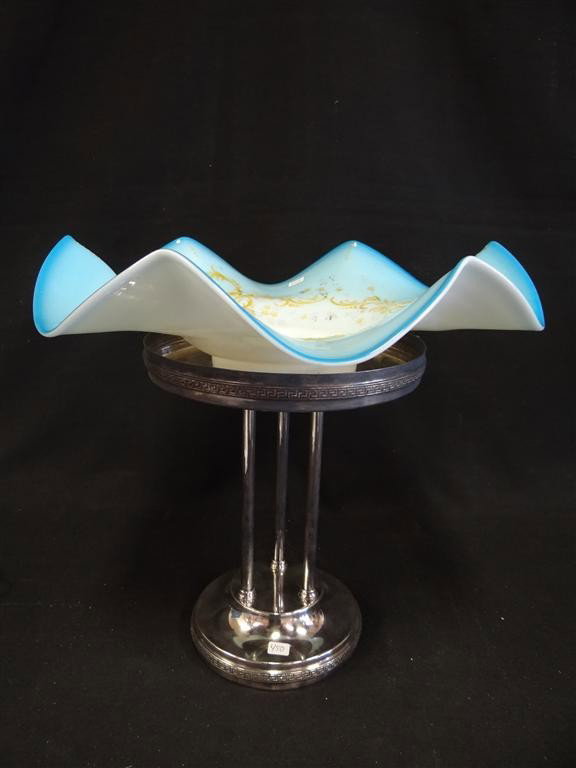AMERICAN VICTORIAN FIGURAL COMPOTE: With a blue undulating satin glass isert having enameled decorations held up on a silverplated base. Apollo Silver Co. #311. (probably married arrangement) 12"H