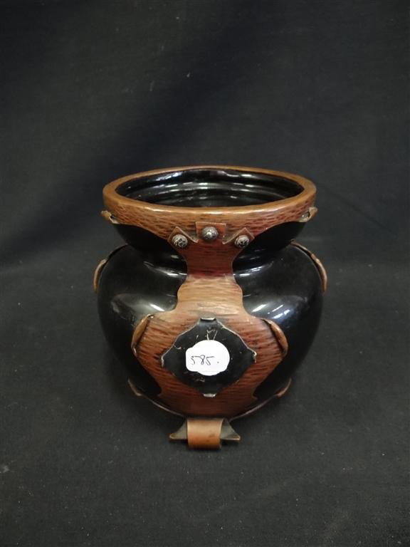 SILVER AND COPPER ARTS AND CRAFTS HUMIDOR: Hand wrought copper scrolled mounts on a pottery humidor. Marked on the bottom Copper and Silver 15 5 3/4" H. x 4 1/2"W