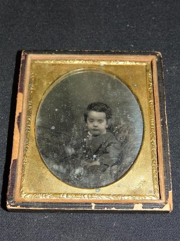 AMBROTYPE OF A CHILD MARKED DAVIS: 3 1/8" x 2 5/8"