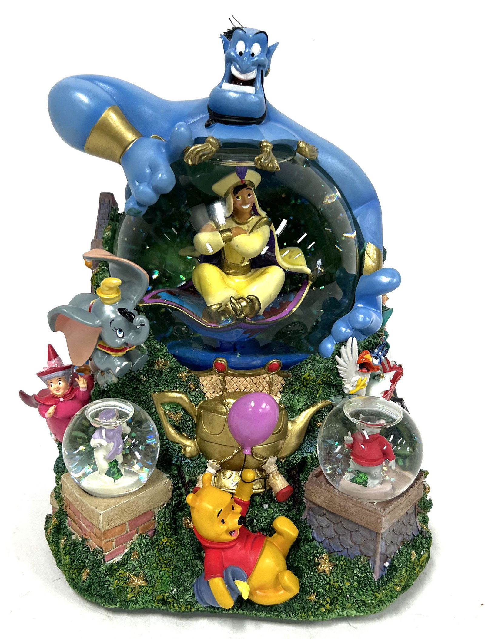 Disney Aladdin "Share a Dream Come True": parade float musical snow globe. 9.75 by 7.5 inches