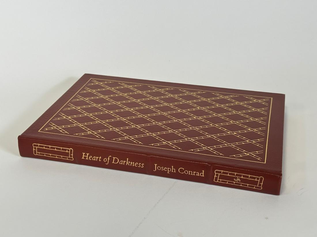 Heart of Darkness, Joseph Conrad; Easton Press: Brown leather bound, 1980. Most books in this collection are in Unused Condition. Some have minor flaws from sitting on book shelves that we'll show when photographing if significant enough.