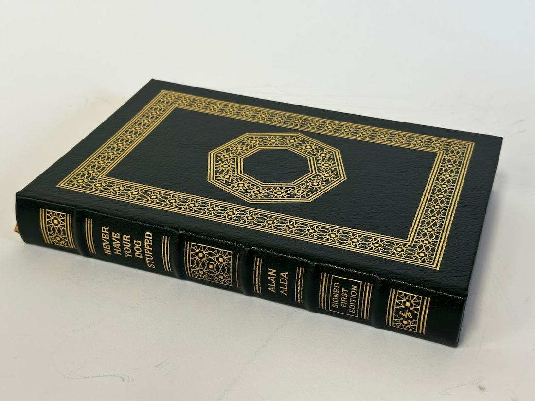 Never Have Your Dog Stuffed, Alan Alda - Sgd. First Edition; Easton Press: Green leather bound, 2005. Most books in this collection are in Unused Condition. Some have minor flaws from sitting on book shelves that we'll show when photographing if significant enough.