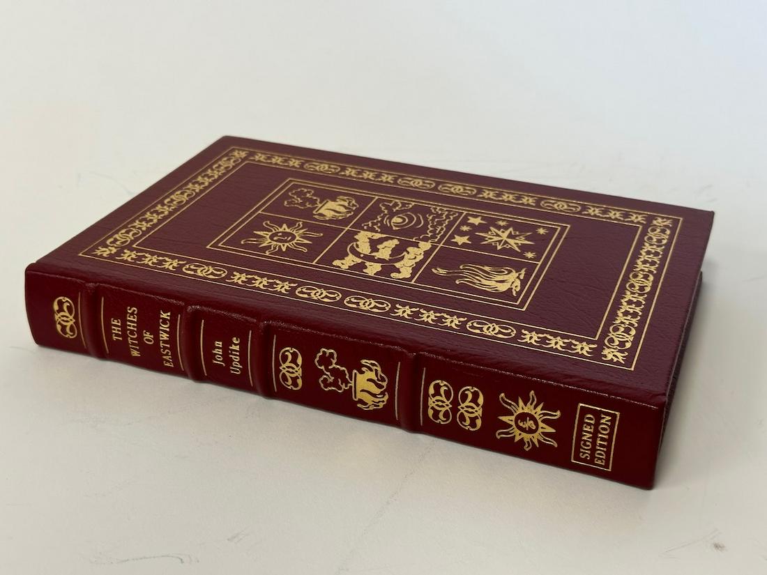 The Witches of Eastwick, John Updike - Sgd. Edition; Easton Press: Red leather bound, 1984. Most books in this collection are in Unused Condition. Some have minor flaws from sitting on book shelves that we'll show when photographing if significant enough.