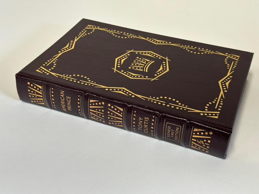 American Prince, Tony Curtis - Sgd. First Edition; Easton Press: Black leather bound, 2008. Most books in this collection are in Unused Condition. Some have minor flaws from sitting on book shelves that we'll show when photographing if significant enough.