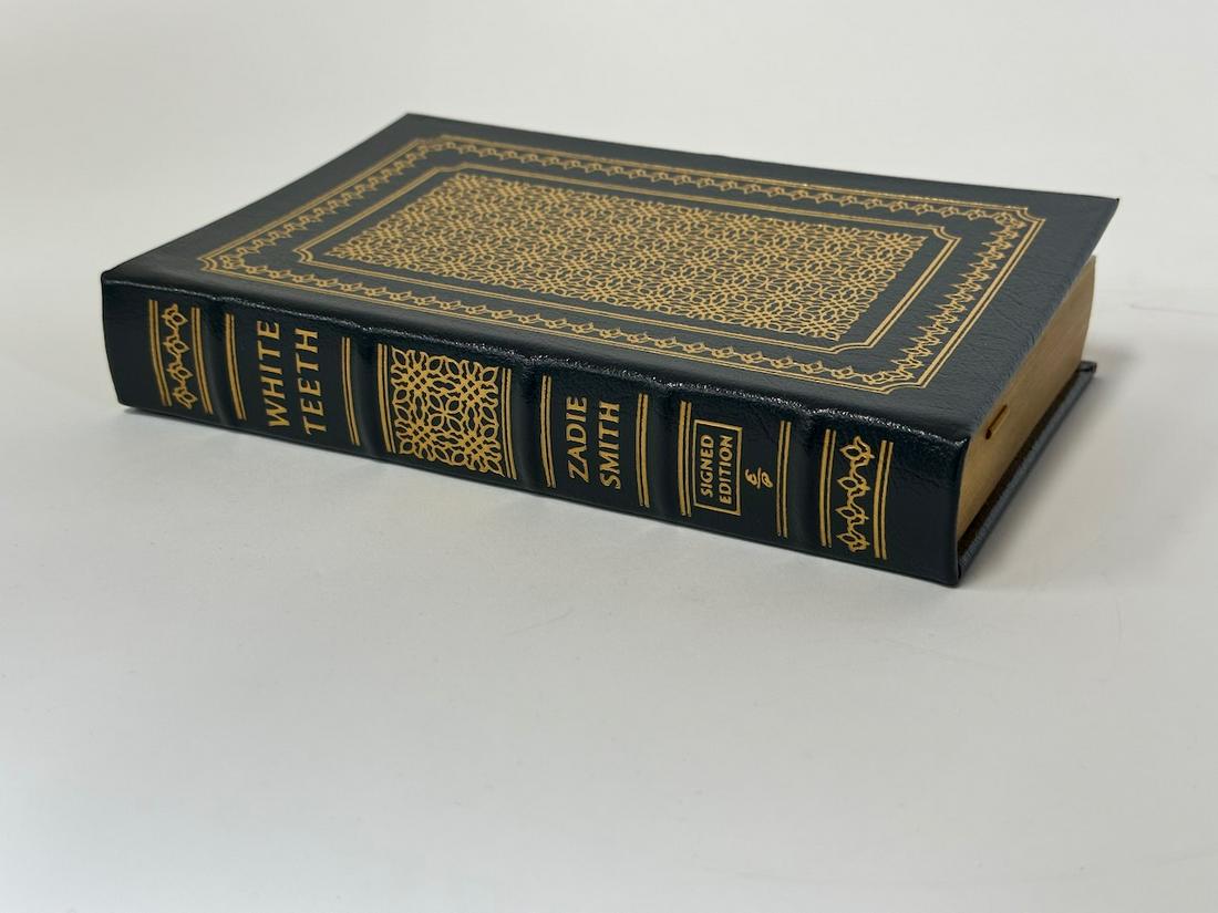 White Teeth, Zadie Smith - Sgd. Edition; Easton Press: Green leather bound, 2007. Most books in this collection are in Unused Condition. Some have minor flaws from sitting on book shelves that we'll show when photographing if significant enough.