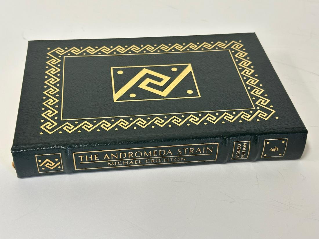 The Andromeda Strain, Michael Crichton - Sgd. Edition; Easton Press: Green leather bound, 2003. Most books in this collection are in Unused Condition. Some have minor flaws from sitting on book shelves that we'll show when photographing if significant enough.