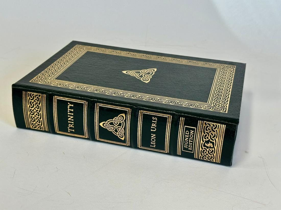 Trinity, Leon Uris - Sgd. Edition; Easton Press: Blue leather bound, 1999. Most books in this collection are in Unused Condition. Some have minor flaws from sitting on book shelves that we'll show when photographing if significant enough.