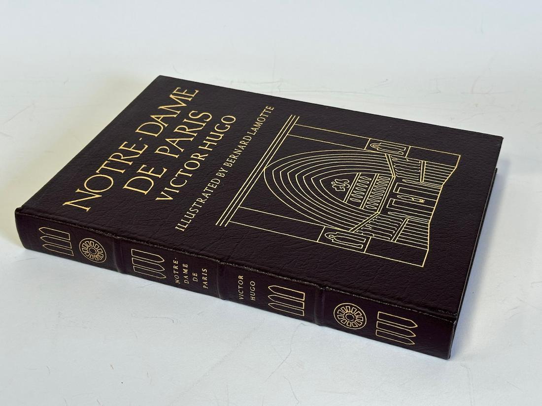 Notre Dame de Paris, Victor Hugo; Easton Press: Maroon leather bound, 1983. Most books in this collection are in Unused Condition. Some have minor flaws from sitting on book shelves that we'll show when photographing if significant enough.