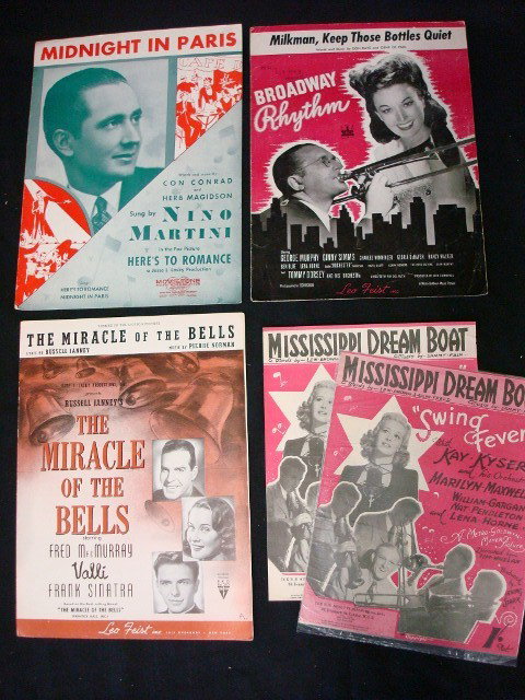 Thirty One Pieces of Sheet Music: Midnight In Paris - Here's To Romance; Milkman Keep Those Bottles Quiet - Broadway Rhythm; The Miracle of the Bells - Valli; Mississippi Dream Boat - Swing Fever (2); Mississippi Dream Boat; Mister Fi