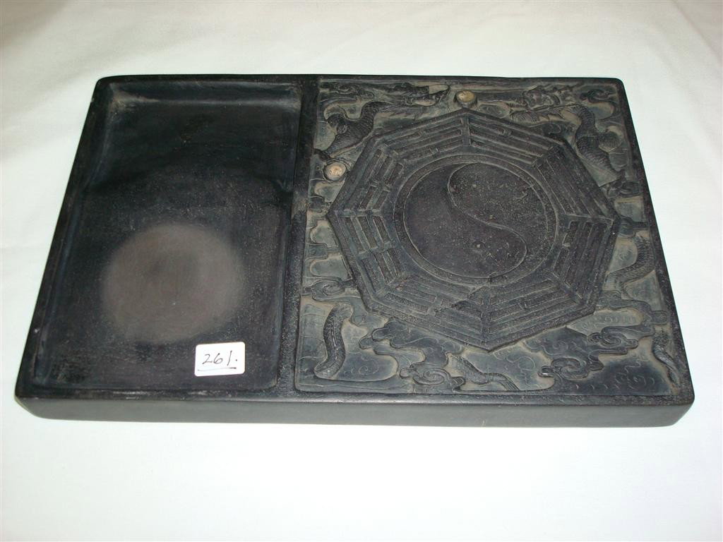 DUANE INKSTONE CARVED WITH YING & YANG UNDER TWO D: Carved with yin & yang under two dragons. 8" X 12"