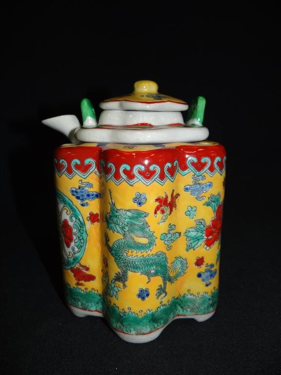 CHINESE PORCELAIN TEA POT, THREE PART: On a yellow ground painted with leaping green dragons. With a seal mark. 6 1/4"H.