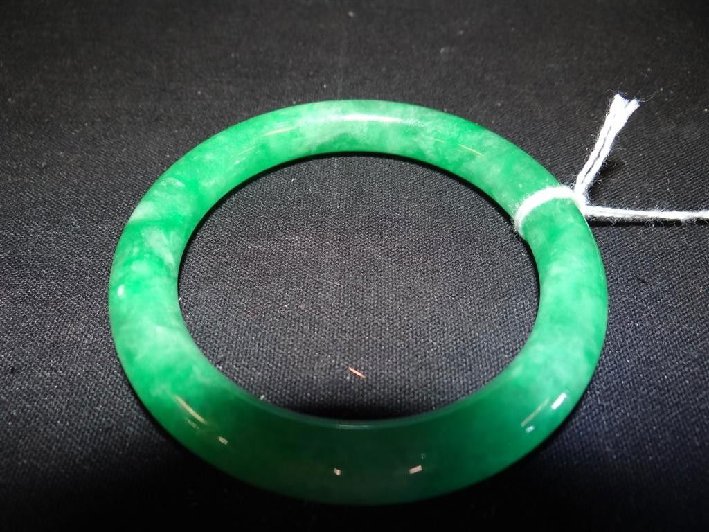 CHINESE JADEITE JADE BANGLE: Chinese apple green jadeite jade bangle 2 1/4" inside