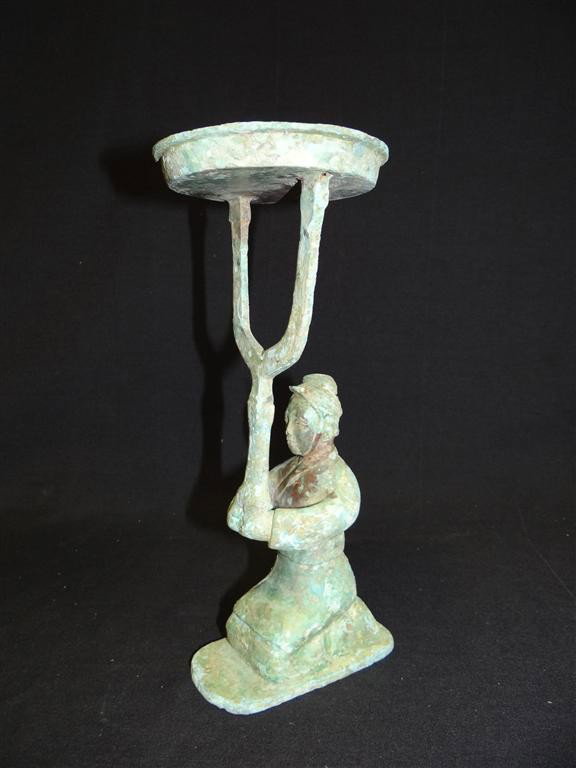 CHINESE BRONZE OIL LAMP: Oil lamp, candle holder, figural bronze kneeling figure in the Han Dynasty manner. 10 1/2"H.